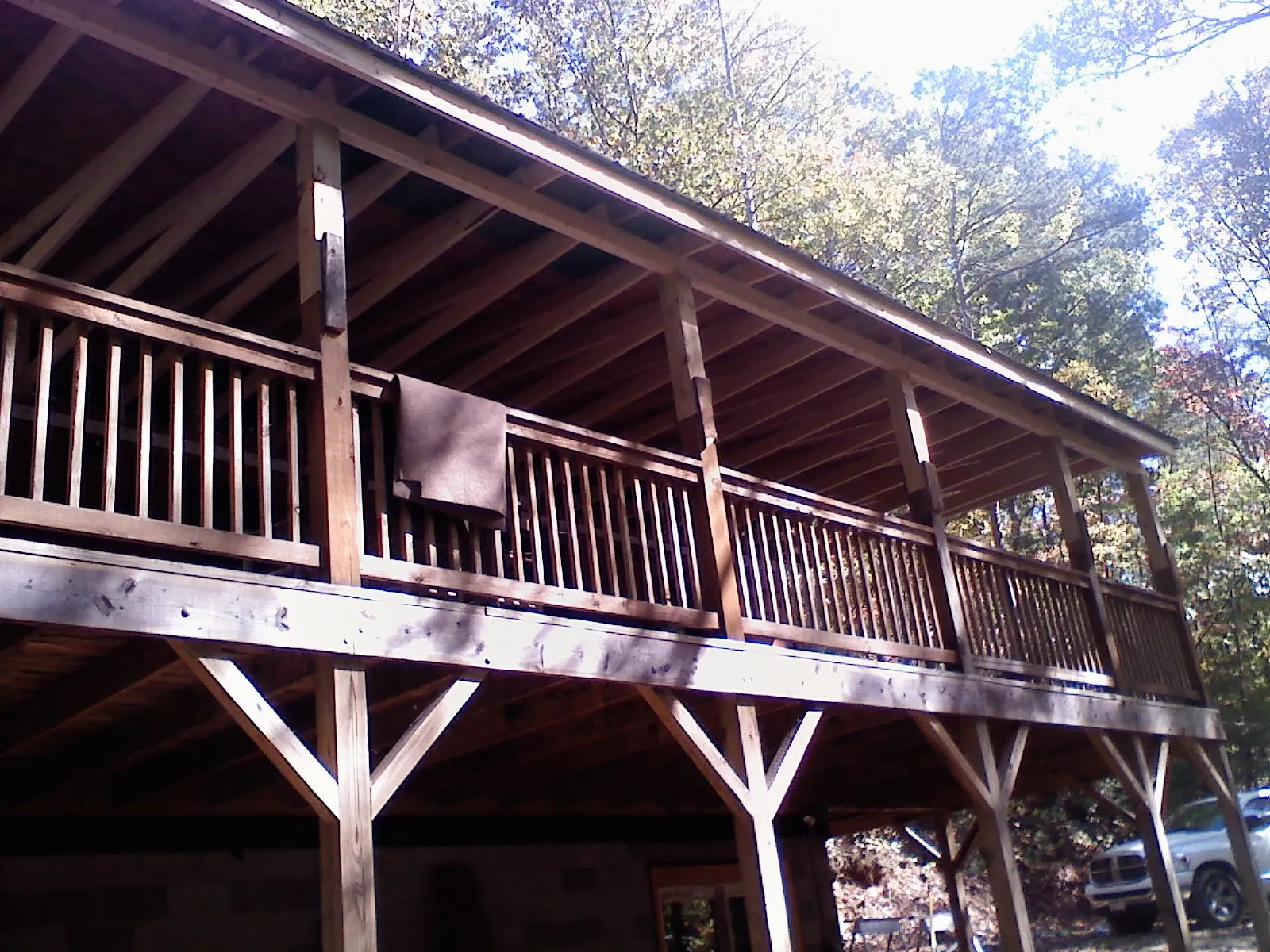 Timber framing under a new elevated porch and deck — Roof Leak Repair in Glidden by Roofing Brothers